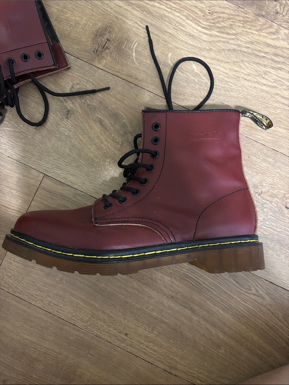 Dr. Martens Red Leather Lace-Up Combat Boots with Yellow Welt Stitch